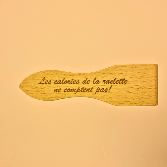 Spatule à raclette "Les calories de la raclette ne comptent pas !"